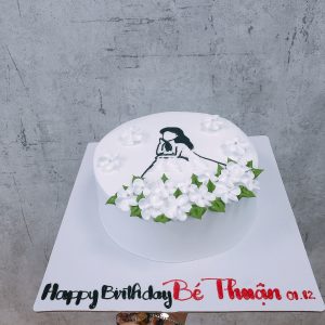 Bánh kem cô gái hoa váy trắng